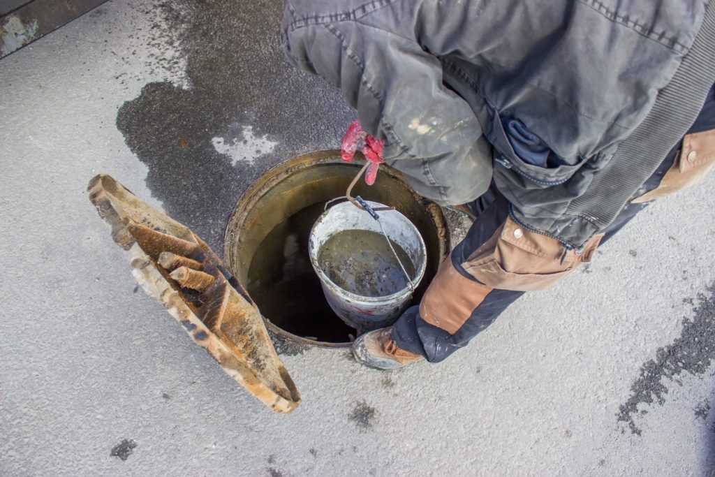 Cleaning Outdoor Blocked Drain 